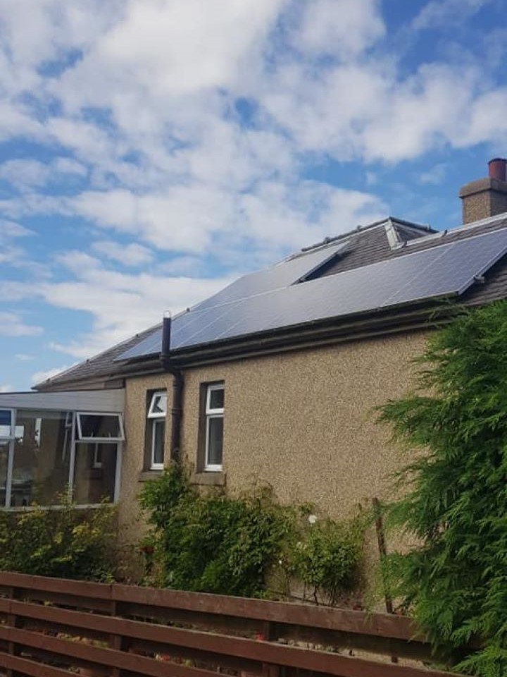 Ground-mounted solar rows in field