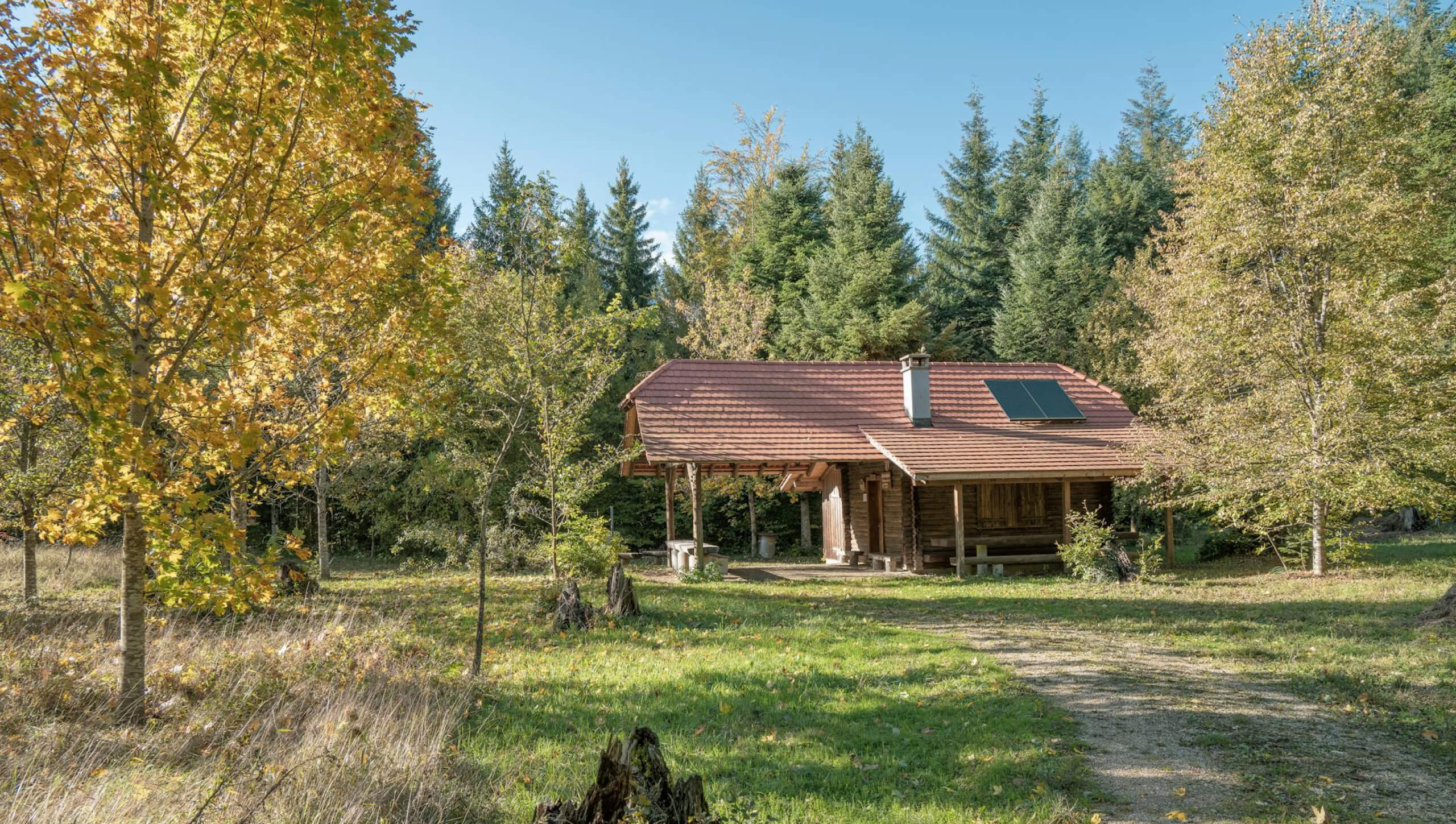 A residential home with professionally installed solar panels on the roof, designed for maximum energy efficiency and sustainability.