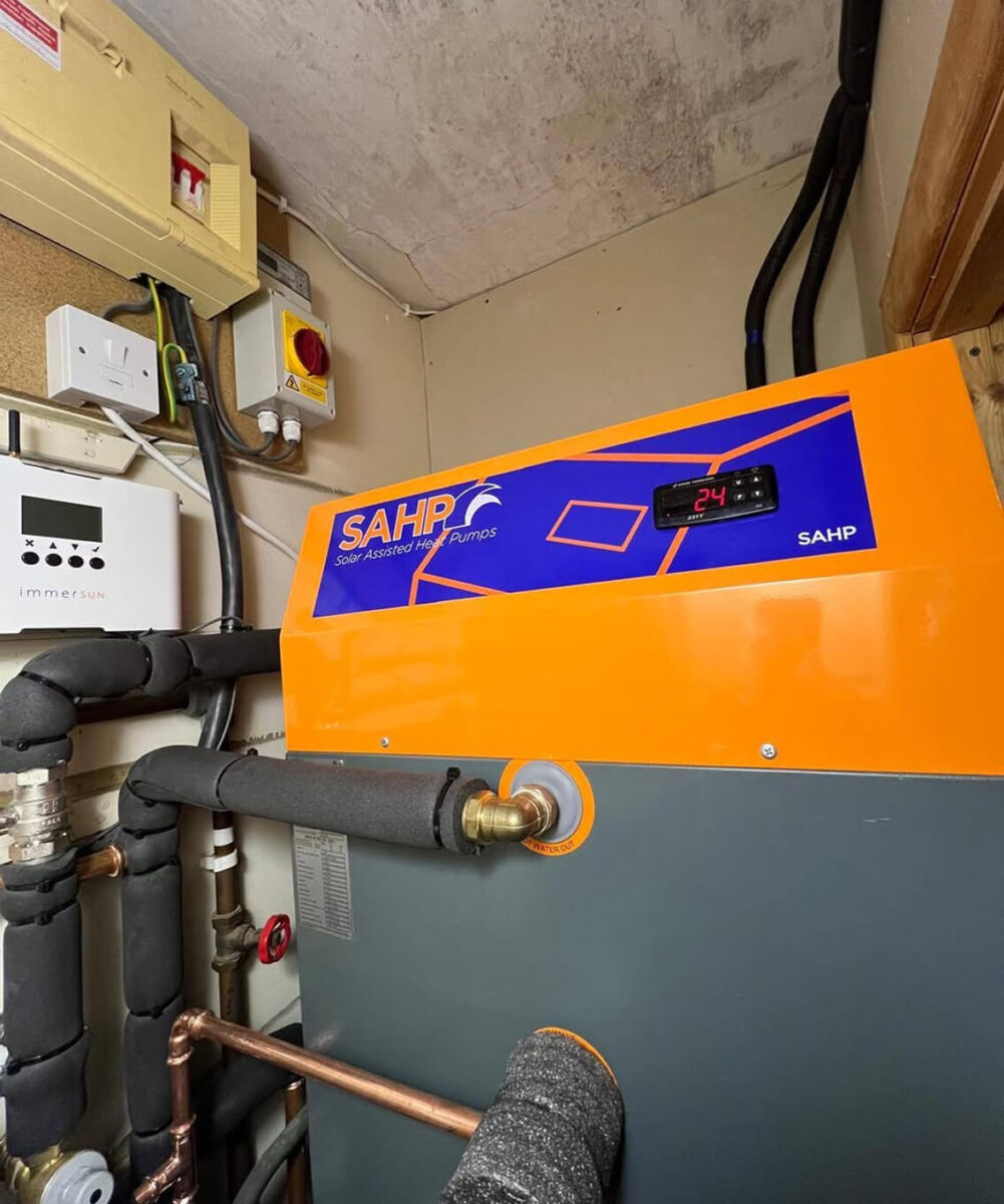 A solar-assisted heat pump professionally installed in a residential space, offering energy-efficient heating and cooling solutions.