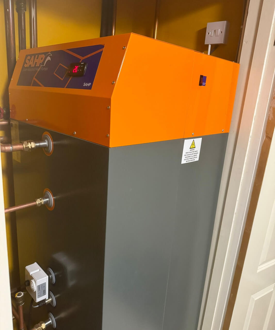 A high-performance solar-assisted heat pump system installed in a residential space, providing eco-friendly heating and cooling.