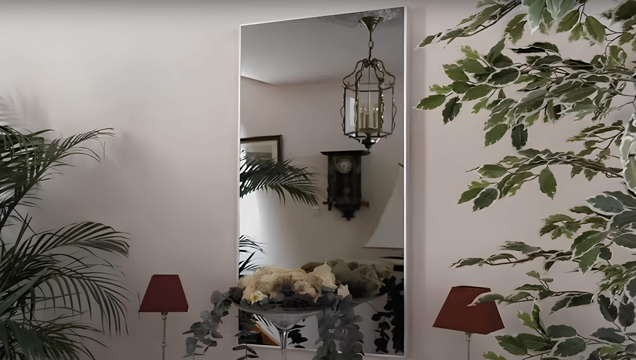 Elegant glass infrared heating panel installed in a warm and refined dining room.