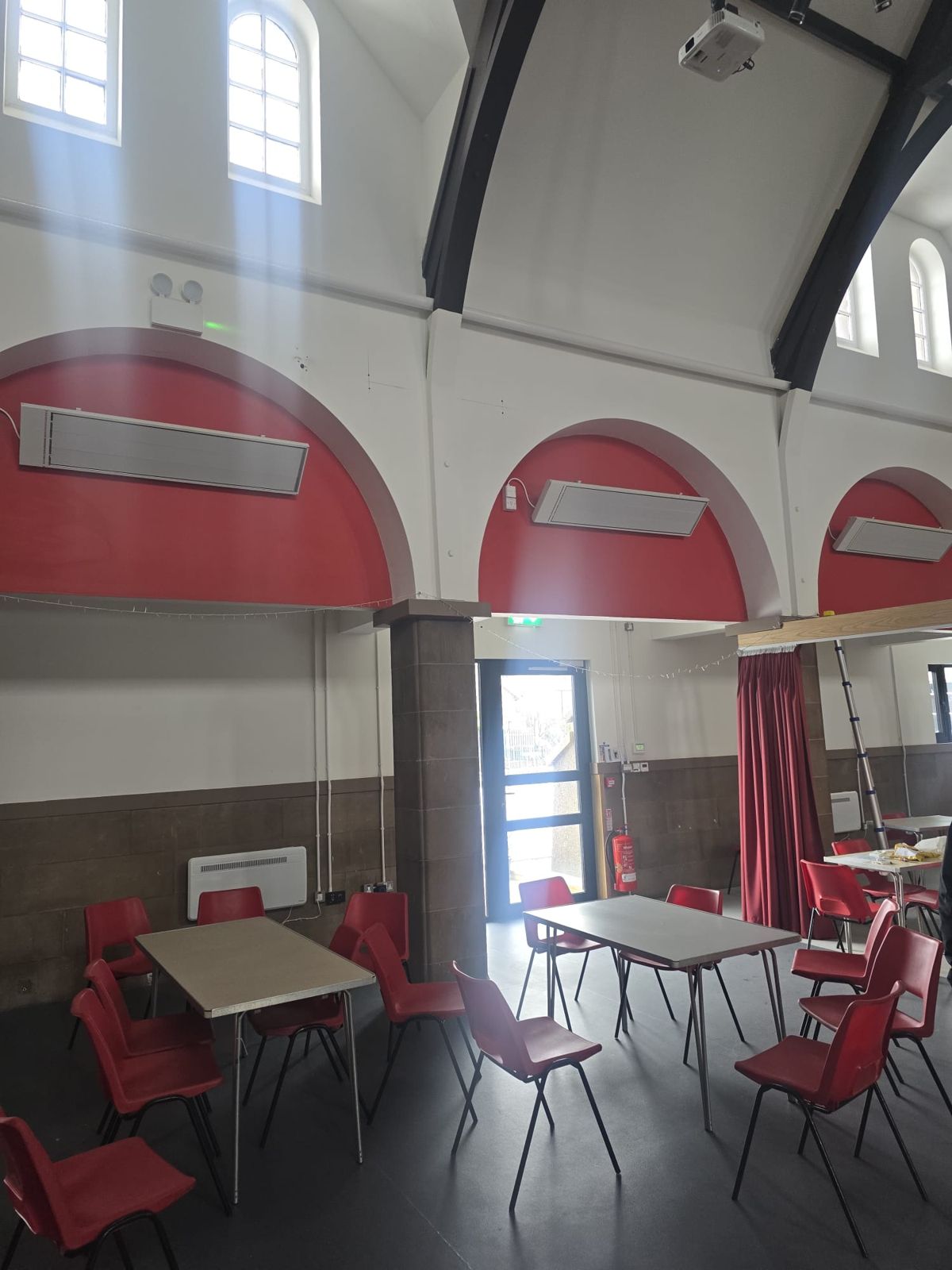Church hall heated with infrared panels